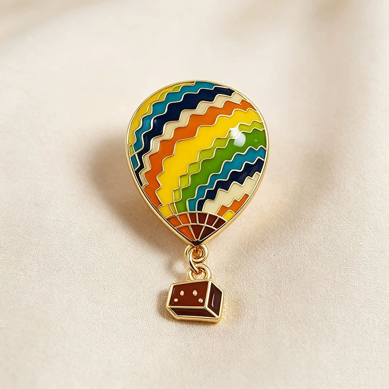 Embroidery Bali - Metalowa broszka w kształcie balonu na